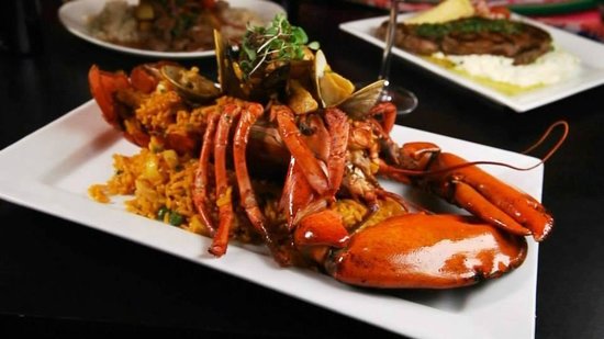 Los Andes signature dishes Ceviche Martini, Lomo Saltado, Lobster Paella